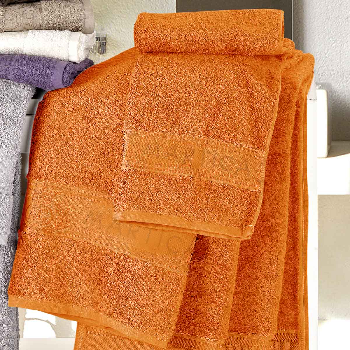 Coppia asciugamani da bagno in spugna di colore arancio - Idrospugna