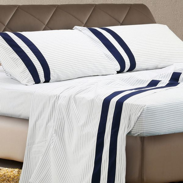 Coppia lenzuola matrimoniale in cotone rigato con balza raso blu - Rigotto