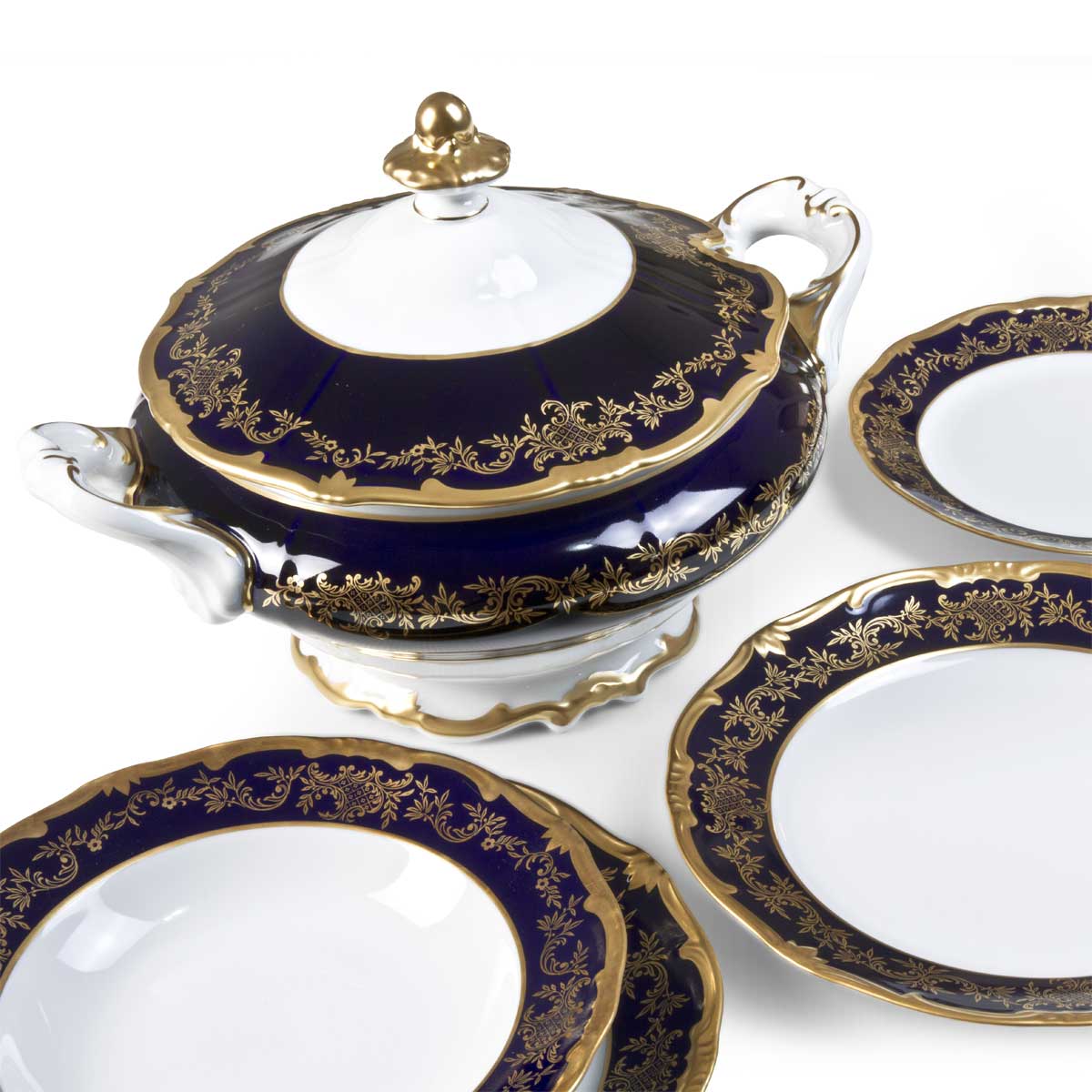 Servizio piatti da collezione interamente realizzato in Germania e dipinto a mano in oro e blu cobalto