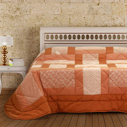 Trapunta invernale dal design moderno di colore arancio con imbottitura anallergica