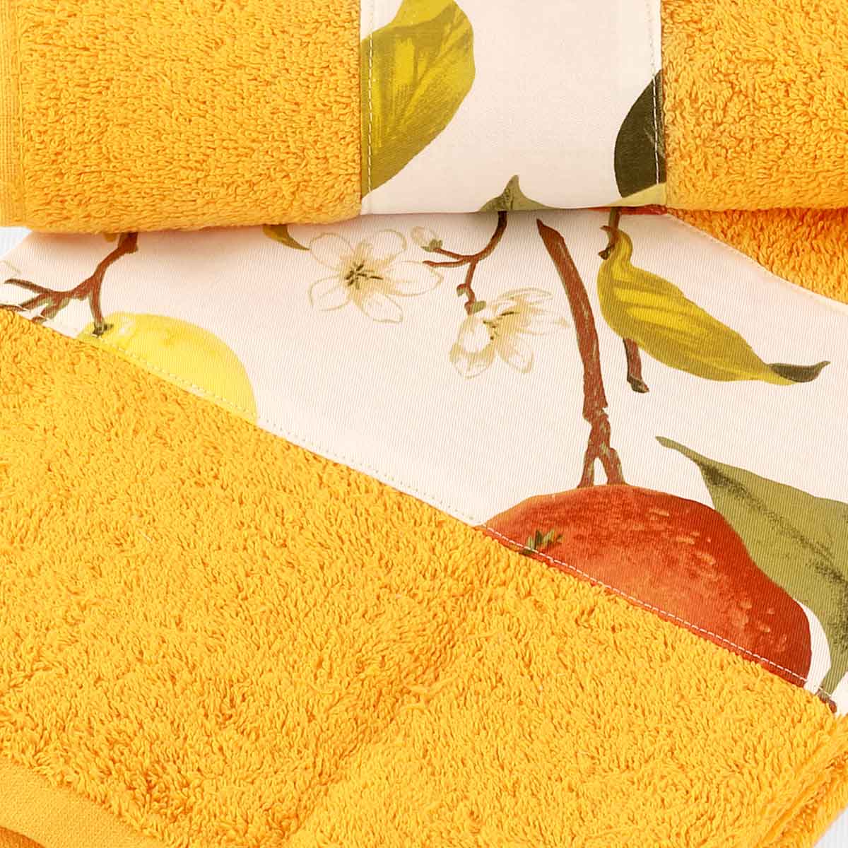 Asciugamani di colore arancio con balza agrumi di produzione italiana