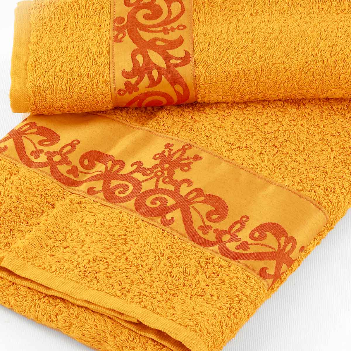 Asciugamani in spugna di colore senape con balza in raso a fantasia - Marabò