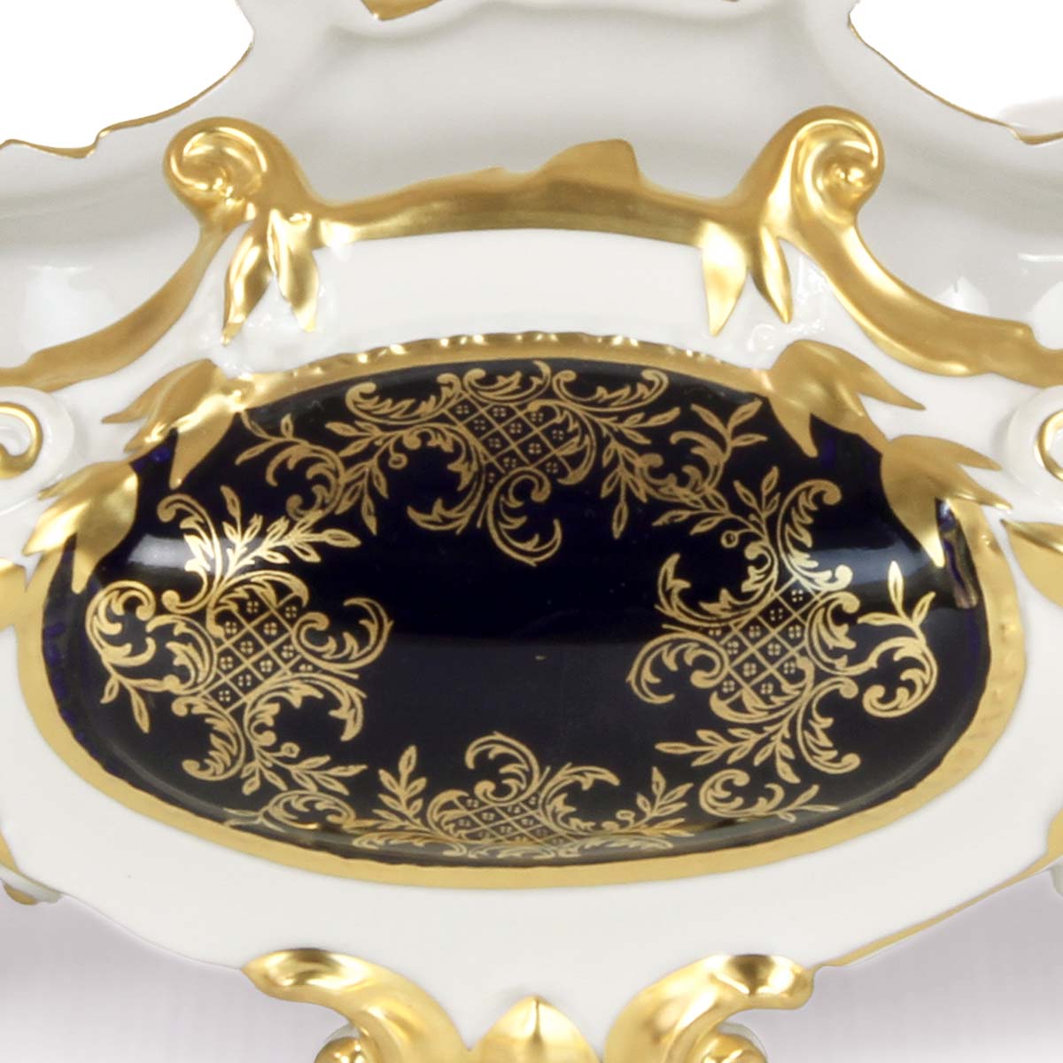 Elegante centrotavola dalla esclusiva forma rettangolare rialzata in porcellana tedesca decoro in oro e blu