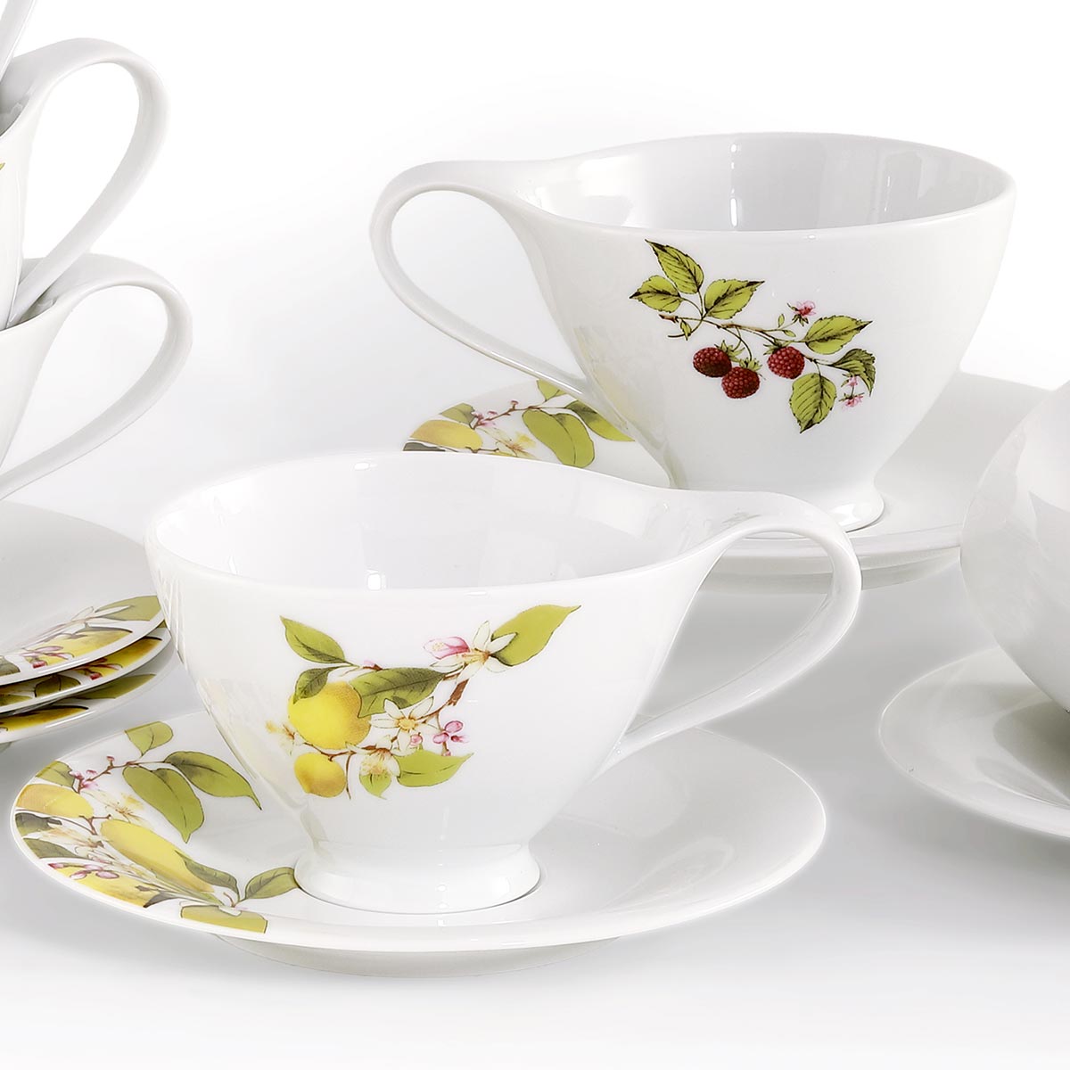 Tazze te con piattino in porcellana fine e decoro limoni lamponi