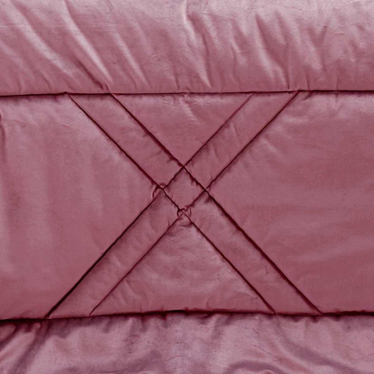 Trapunta letto invernale anallergica moderna di colore rosa antico a rombi